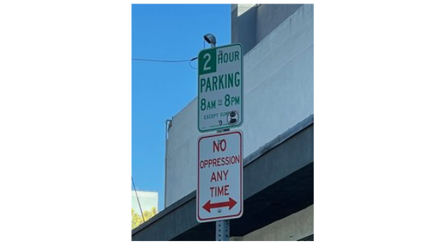 No Oppression parking sign